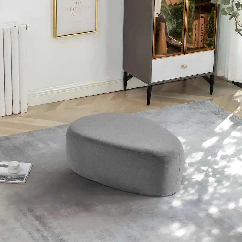 Pouf imbottito triangolare