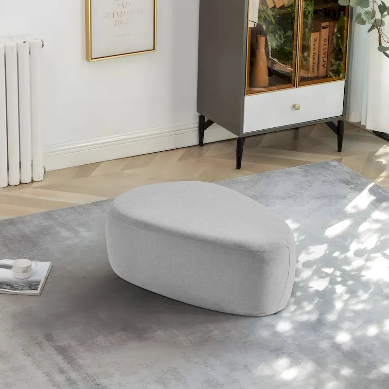 Pouf imbottito triangolare