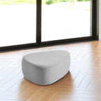 Pouf imbottito triangolare