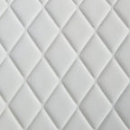 Poltrona girevole accentata in similpelle