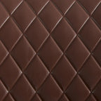Poltrona girevole accentata in similpelle
